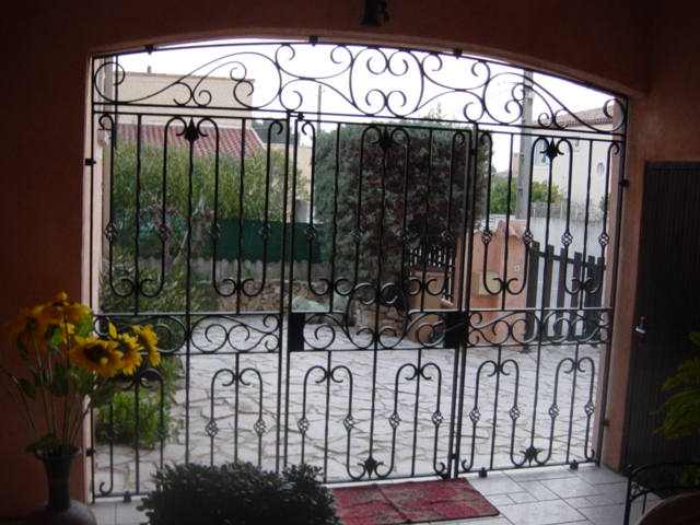 grille en fer forgé sur mesure avec serrure 3 points