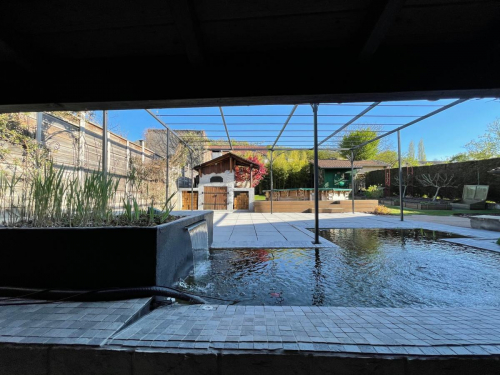 Tonnelle en fer forgé de jardin décor joncs installé en Meurthe et Moselle