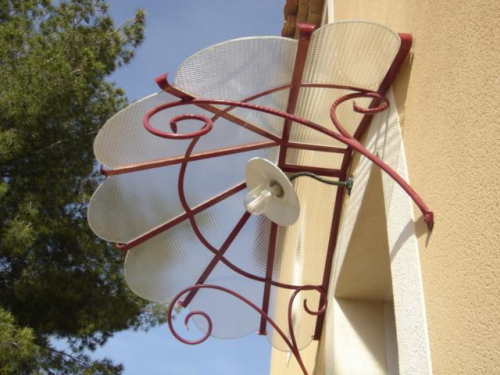 Marquise en fer forgé pour porte entrée à Marseille