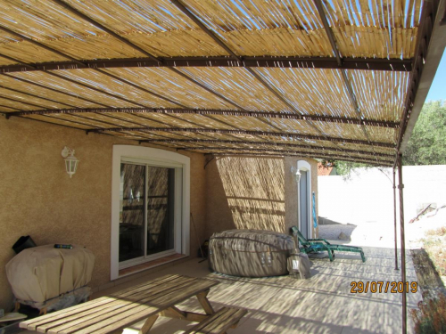 pergola en fer forgé sur mesure pour grande terrasse dans l'Aude