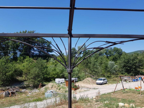 pergola fer forgé pour terrasse en bois Alpes de Haute Provence