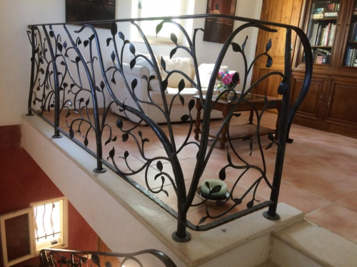 garde-corps palier en fer forgé sur mesure à rognes