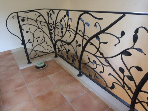 garde-corps palier en fer forgé sur mesure à rognes