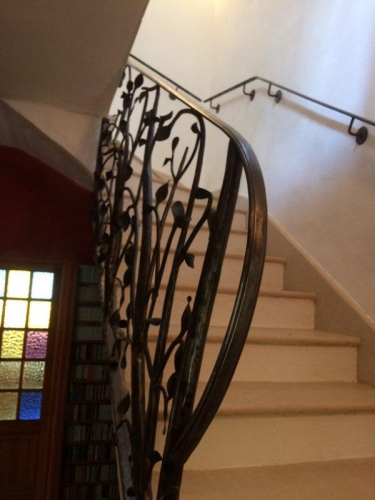 rampe en fer forgé sur mesure à rognes