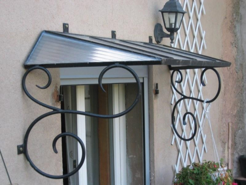 marquise en fer forgé pour porte
